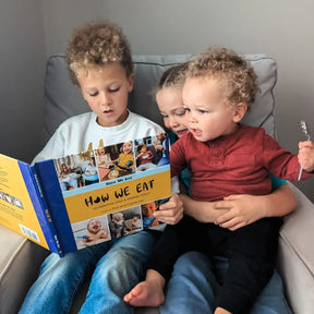 Children reading Little Feminist books together