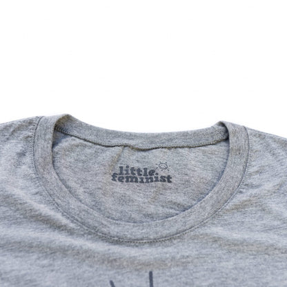 Raising Little Feminists grey women's shirt inside label