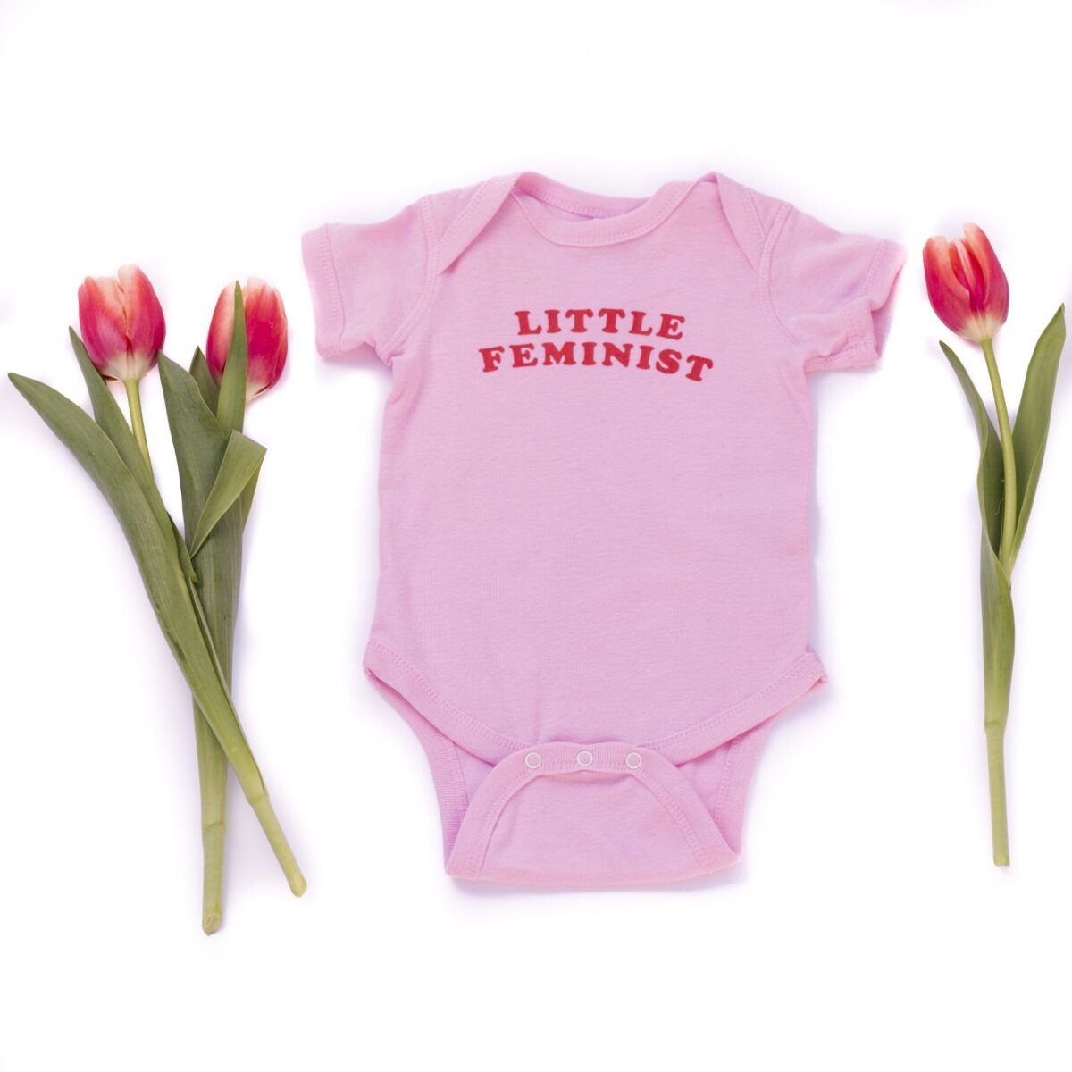 Little Feminist pink onesie
