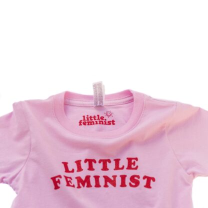 Little Feminist pink kid's shirt inside label