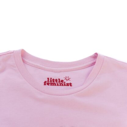 Raising Feminists pink adult shirt inside label